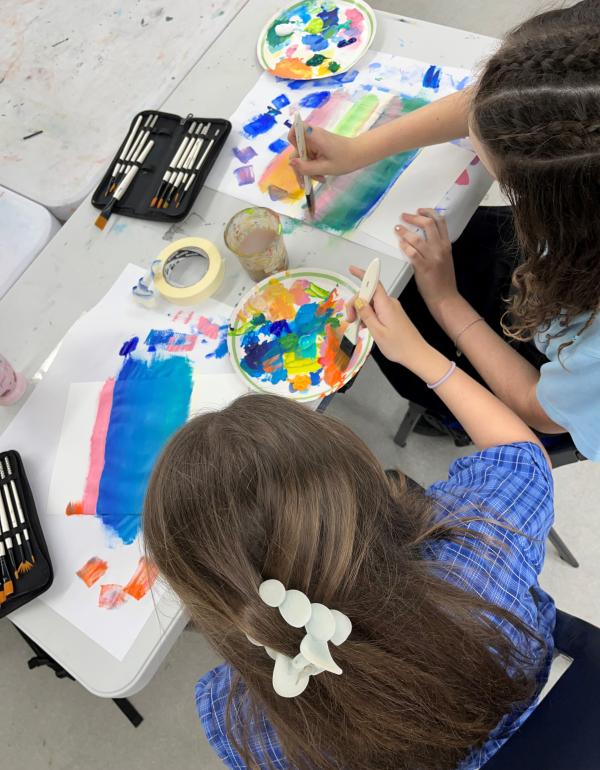 girls painting with watercolour