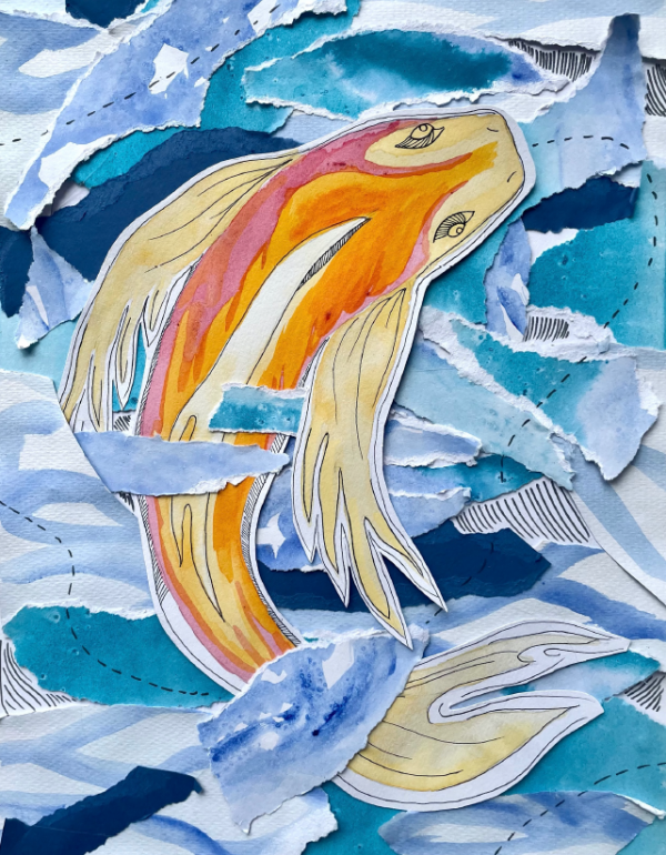 A yellow and orange fish in blue water.