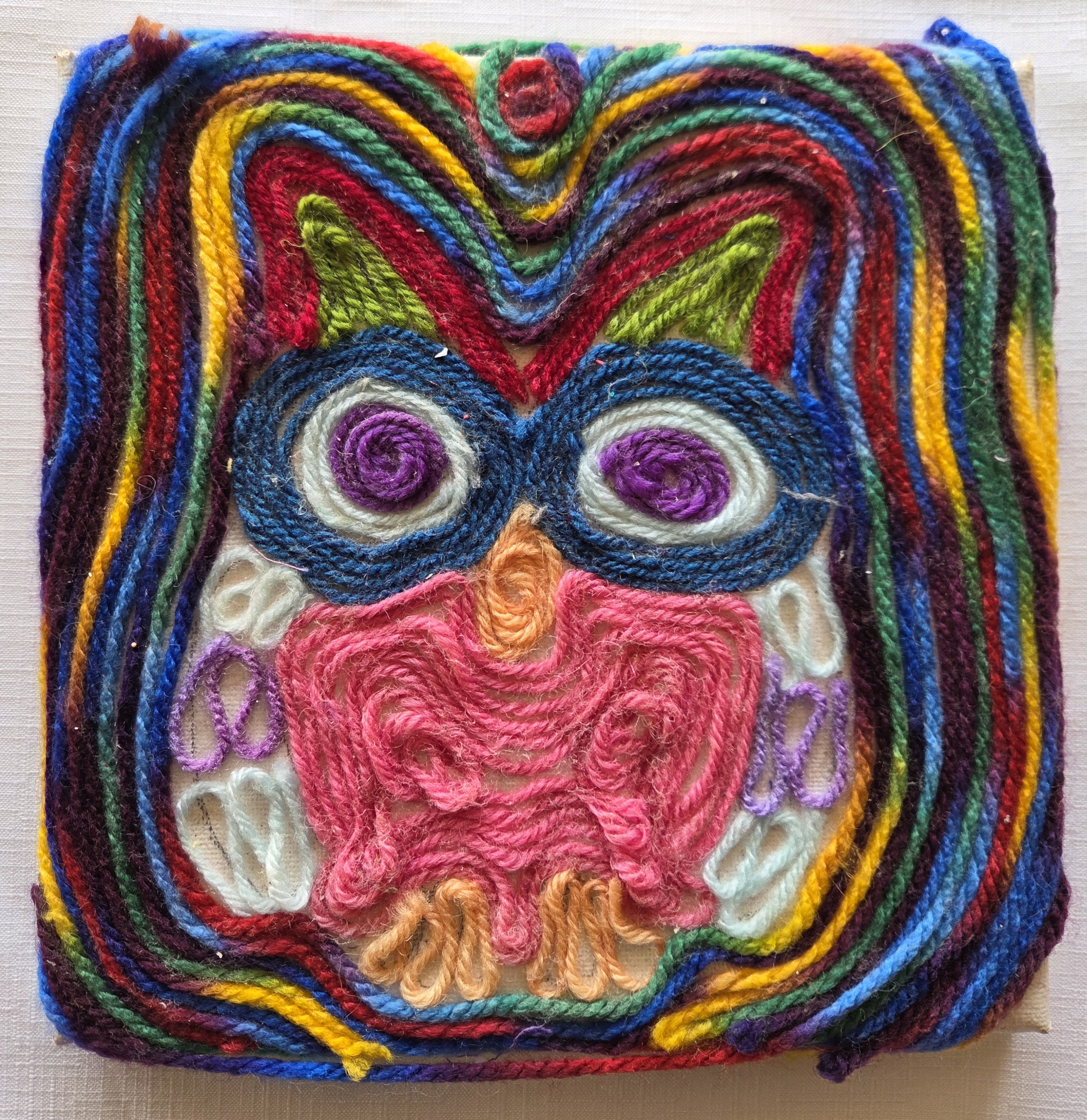Textile owl picture made from wool