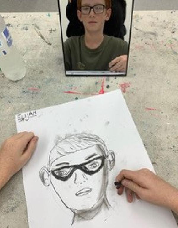 Charcoal drawing of a face