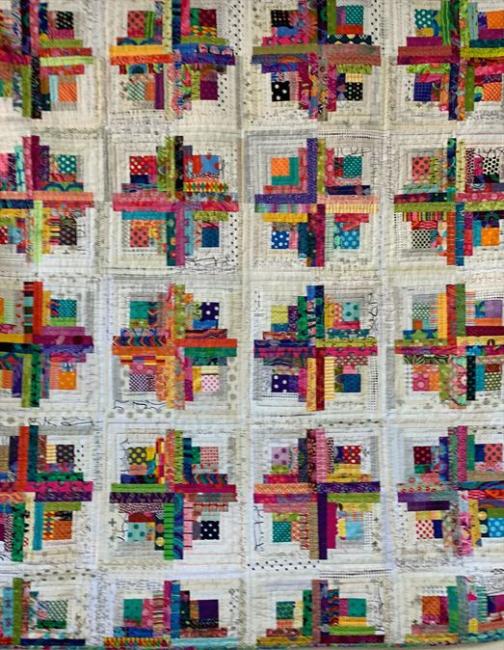 Detail of a colourful quilt