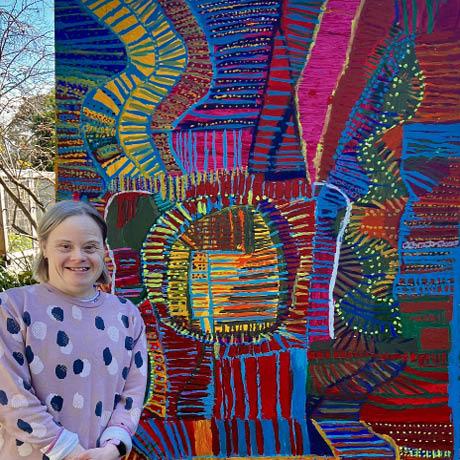 Belinda Phipps in front of her painting called Big Africa