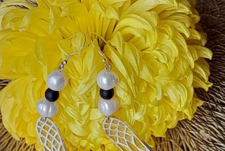 Dangle Earrings on a flower